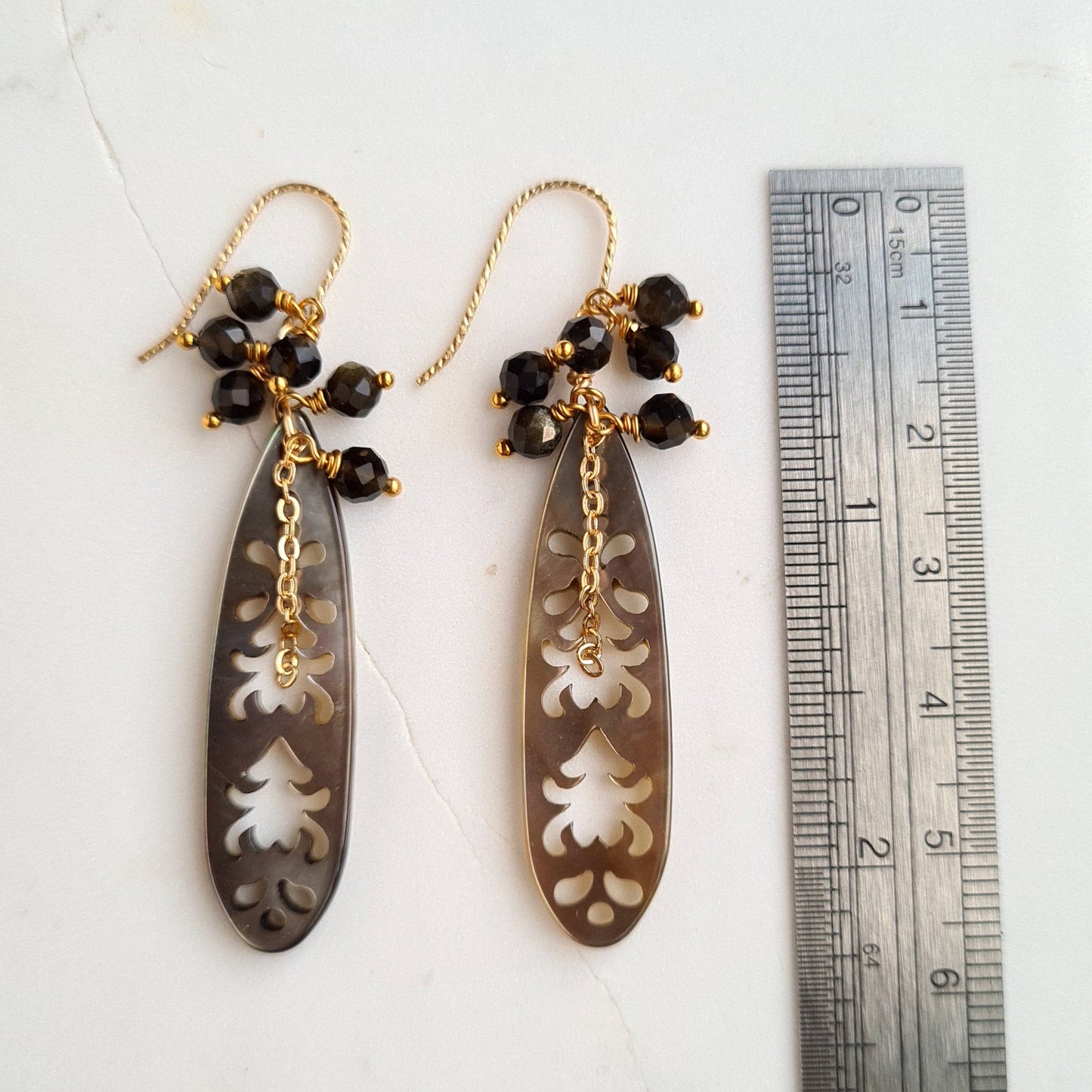 Black carved mother of pearl with golden obsidian cluster gemstone earrings