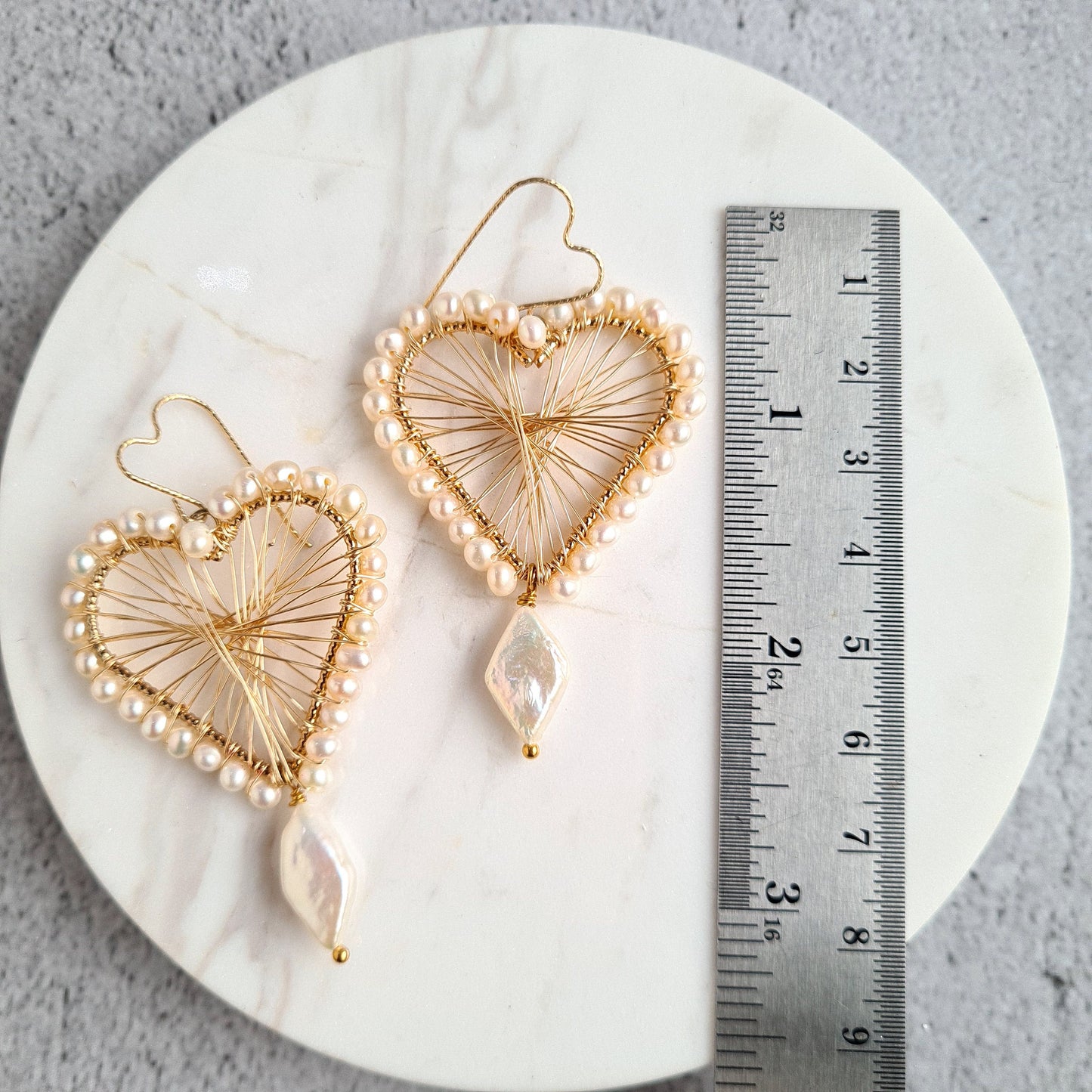 Heart Maze Frame embellished with fresh water pearl, with a diamond fresh water pearl drop, hung on a heart shape ear wire