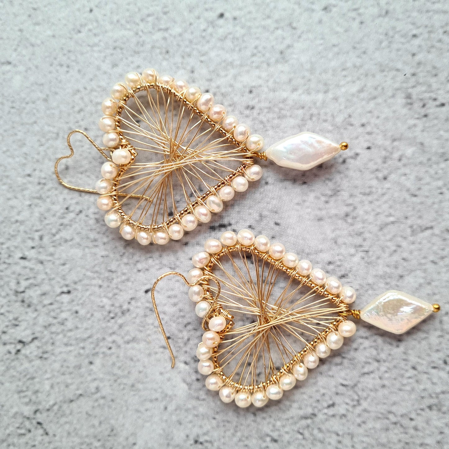 Heart Maze Frame embellished with fresh water pearl, with a diamond fresh water pearl drop, hung on a heart shape ear wire