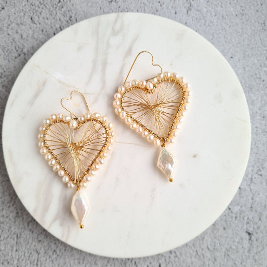 Heart Maze Frame embellished with fresh water pearl, with a diamond fresh water pearl drop, hung on a heart shape ear wire