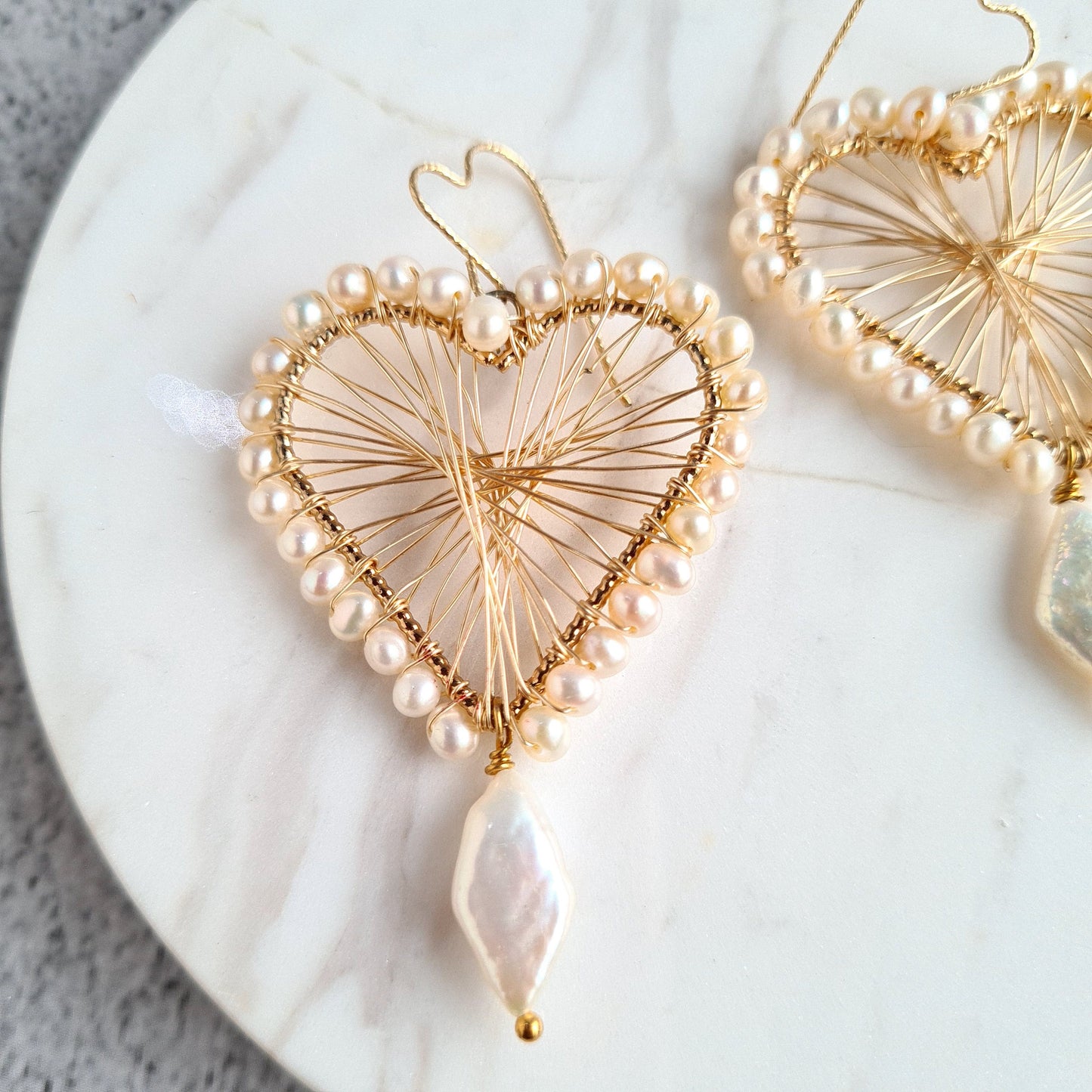 Heart Maze Frame embellished with fresh water pearl, with a diamond fresh water pearl drop, hung on a heart shape ear wire