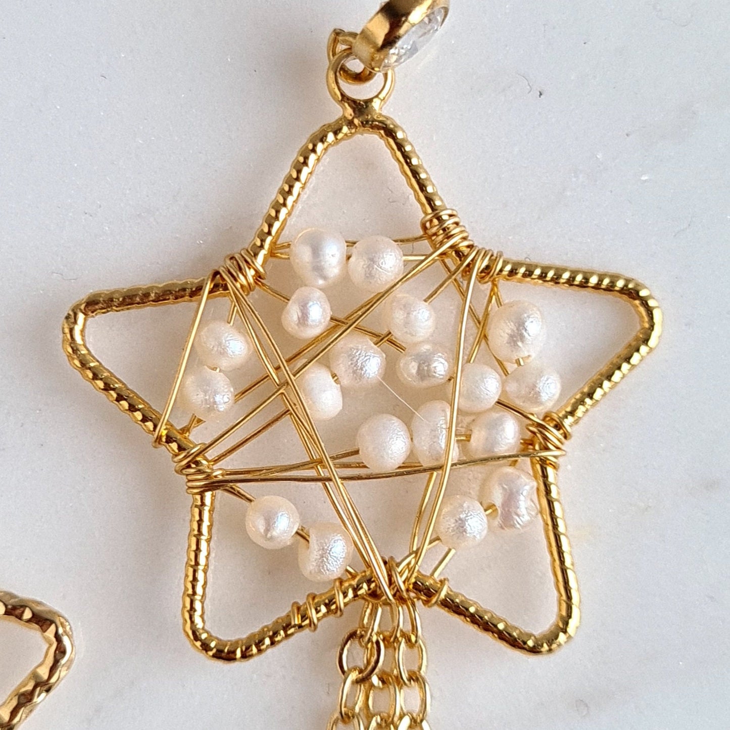 Star wrapped with fresh water pearl with star tassel Earrings