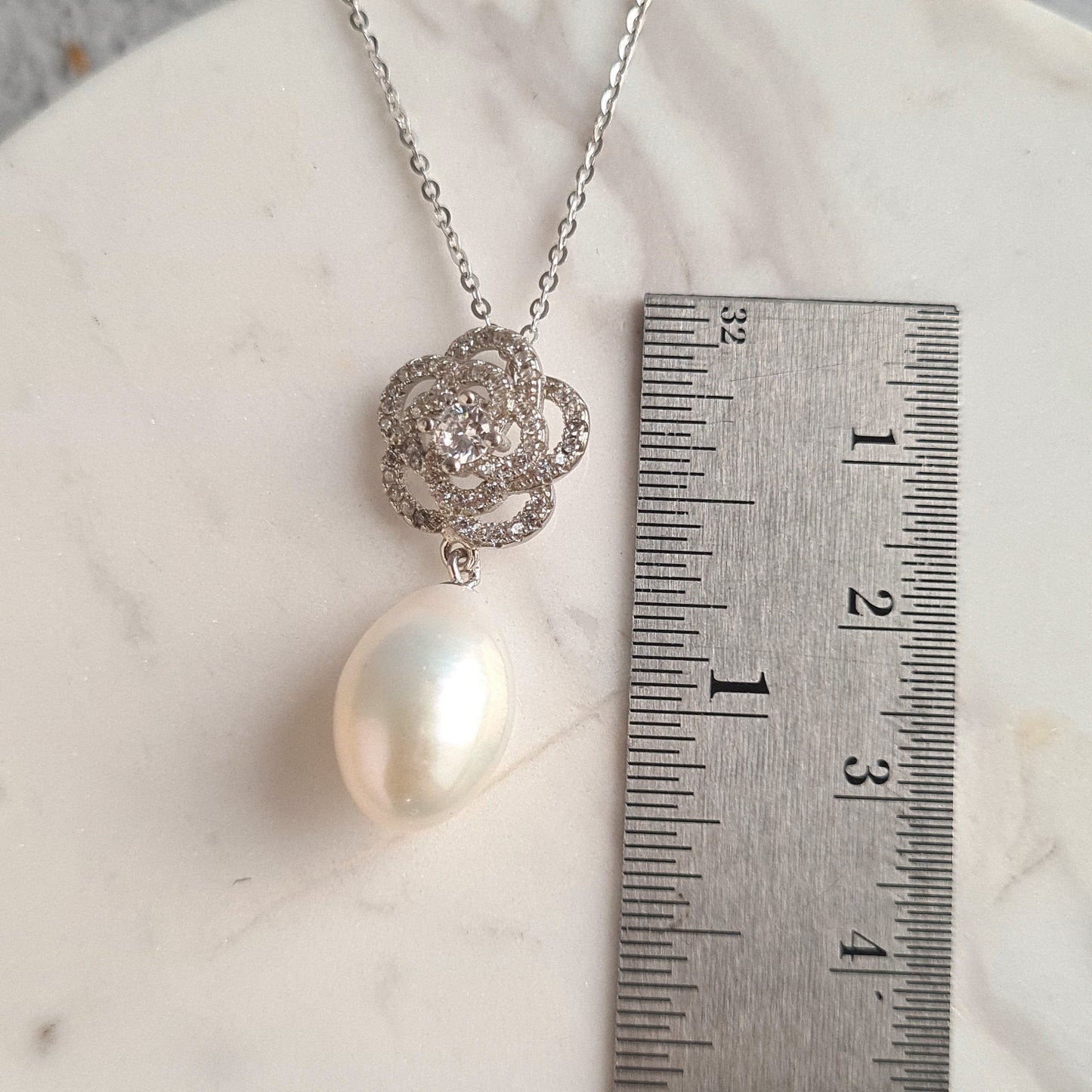 AAA Quality Oval Fresh Water Pearl with Rose design Sterling Silver Stud with Cubic Zirconia Crystal Earrings