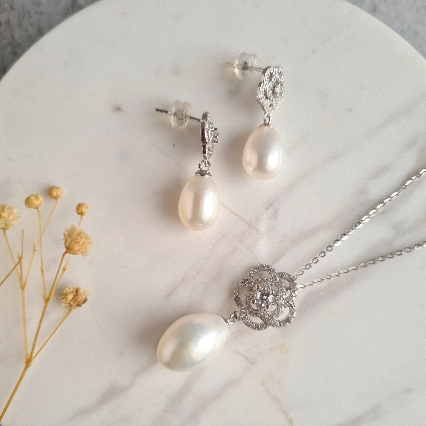 AAA Quality Oval Fresh Water Pearl with Rose design Sterling Silver Stud with Cubic Zirconia Crystal Earrings