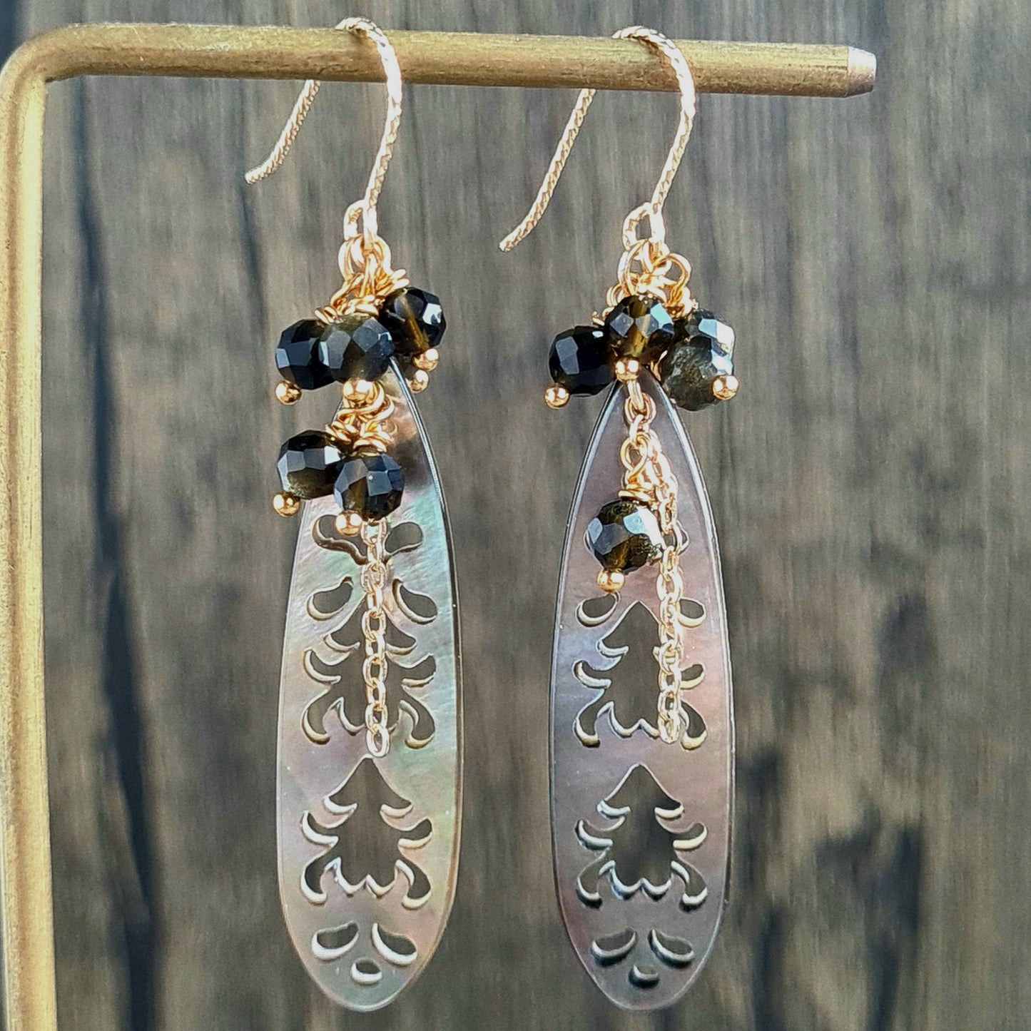 Black carved mother of pearl with golden obsidian cluster gemstone earrings